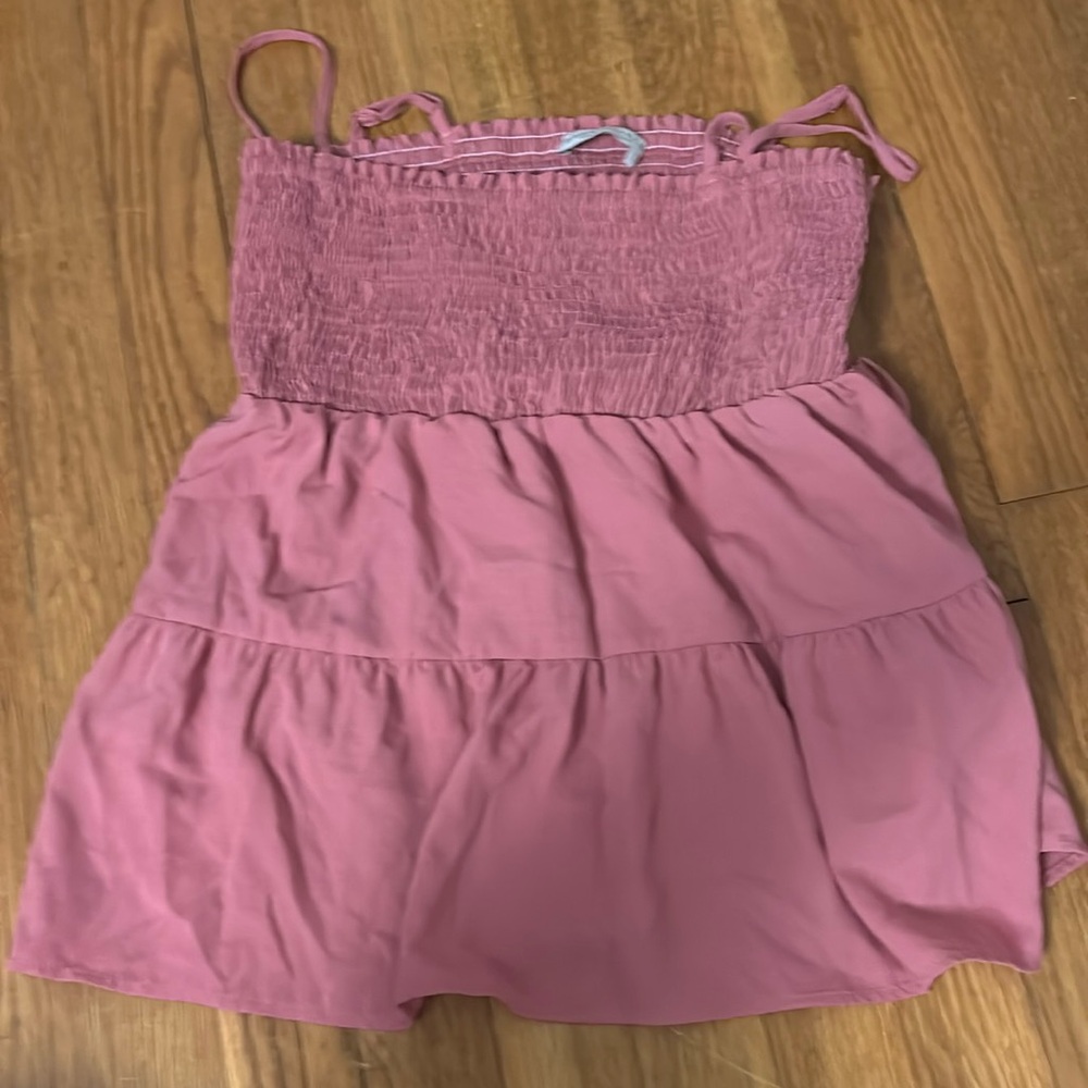 A pink spaghetti strap tank top